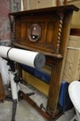 An oak over mantel mirror/fire surround together with a similar fender.