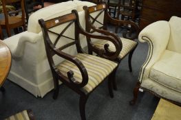 A set of six Regency style mahogany dining chairs, two with arms.