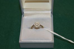 An 18ct gold and diamond cluster ring.