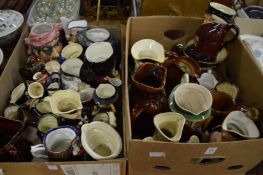 A large collection of Doulton and other character jugs etc.