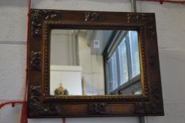 A small decorative mirror.