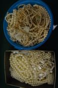 Large quantity of pearl and simulated pearl necklaces and other jewellery.