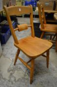 A set of eight Victorian style beech kitchen chairs.