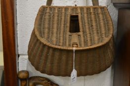 A wicker fishing creel.