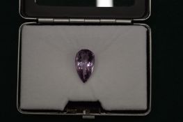 A natural pear shaped amethyst gemstone with certificate.