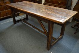 A good 18th century oak refectory dining table.