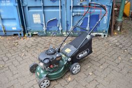 A Webb petrol rotary lawn mower.