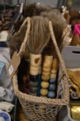 Basket containing a large collection of Chinese brushes.