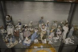 A good collection of Lladro, Nao and other figures.
