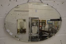 Two oval mirrors.
