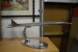 A chrome model of Concorde.