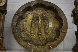 A good heavy cast brass religious charger.