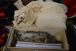 A group of Christening dresses, feather fans etc.