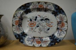 A Staffordshire pottery tree and well meat carving dish.