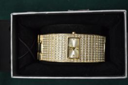 A ladies wristwatch.