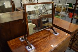 A mahogany dressing table mirror.