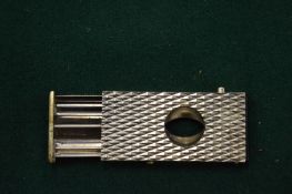 Cigar cutter.