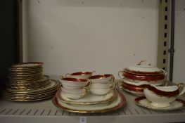 An Aynsley eight place dinner service, pattern number 8013, wavy edge version.