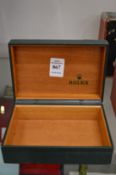 A Rolex wristwatch box.