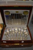 A Viners kings pattern six place canteen of cutlery together with a cutlery box.