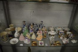 A collection of decorative china to include Doulton figurines.