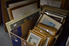 A collection of decorative paintings and prints.