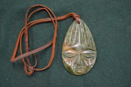 African jade pendant.