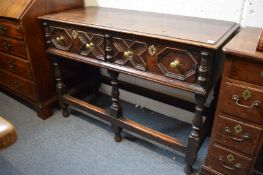 An 18th century style oak two drawer dresser of small size.