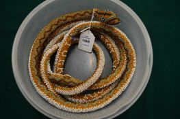 A large Turkish prisoner of war bead work snake.