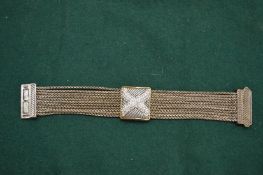 Silver bracelet with diamante decoration.