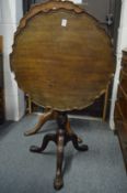A good George III mahogany piecrust tilt-top tripod table.