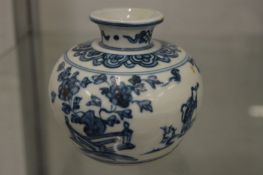 A Chinese blue and white small squat shaped vase.