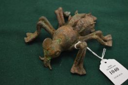 An unusual painted and cast iron model of an insect.
