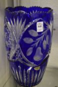 A pair of large Bohemian blue tinted cut glass vases.