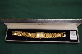 A ladies decorative wristwatch.