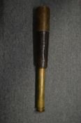 An early brass and leather telescope.