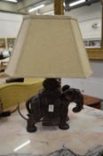 A bronze resin table lamp modelled as an elephant.