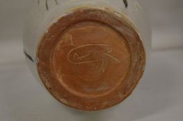 A small cast iron classical style dish.