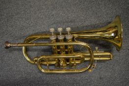 An Odyssey brass trumpet.