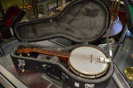 A George Formby banjolele, with case.