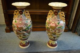 A pair of large satsuma vases (faults).