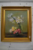 Still life of flowers in a bowl and a vase, oil on canvas in a decorative gilt frame.
