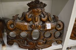 A Continental carved wood frame for portrait miniatures.