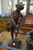 A good large bronze figure of young Mozart playing the violin.