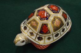 A Crown Derby tortoise.