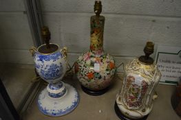 Three decorative porcelain and pottery lamp bases (faults).