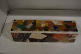 A specimen marble obelisk.