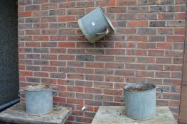 Three galvanised twin handled buckets.