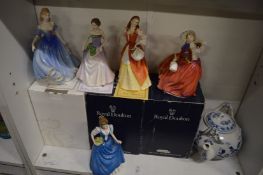 Five Royal Doulton figurines, three with certificates and boxes together with a blue and white