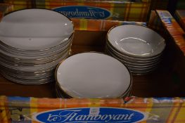 Quantity of Thomas of Germany gilt rimmed dinnerware.